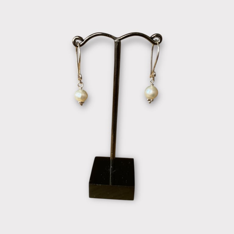 Pearl drop earrings.