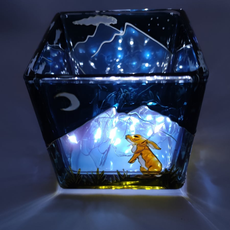 Candle holder, hand painted glass, moon gazing and boxing hares 