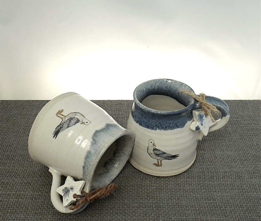  Rustic coast inspired ceramic seagull mug with sea-green rim - handmade pottery