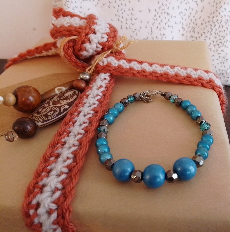 Handmade bracelet made using pre-loved beads.
