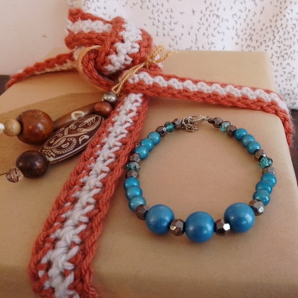 Handmade bracelet made using pre-loved beads.