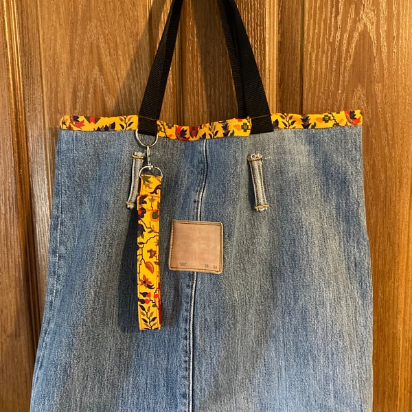 Re purposed denim blue tote bag carefully handmade with wristlet  key fob.
