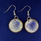 Blue and white dish shaped earrings