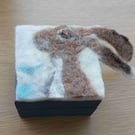 Coorie hare box  small felt lidded box. Contains a small cottage scenery brooch.