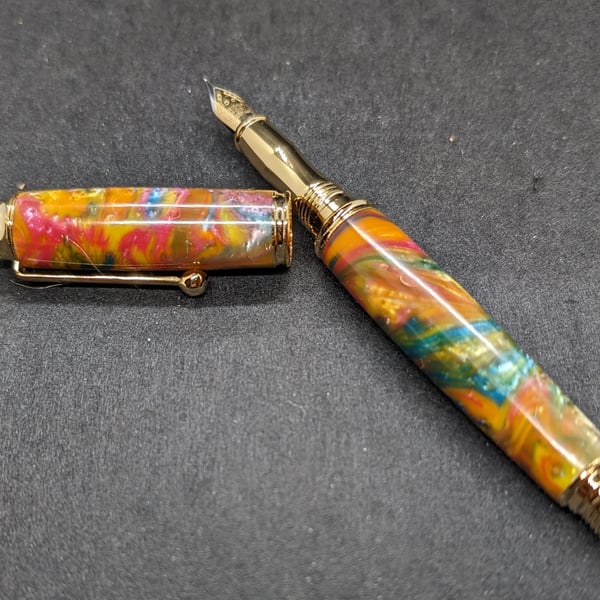 Multi coloured fountain pen in aluminite