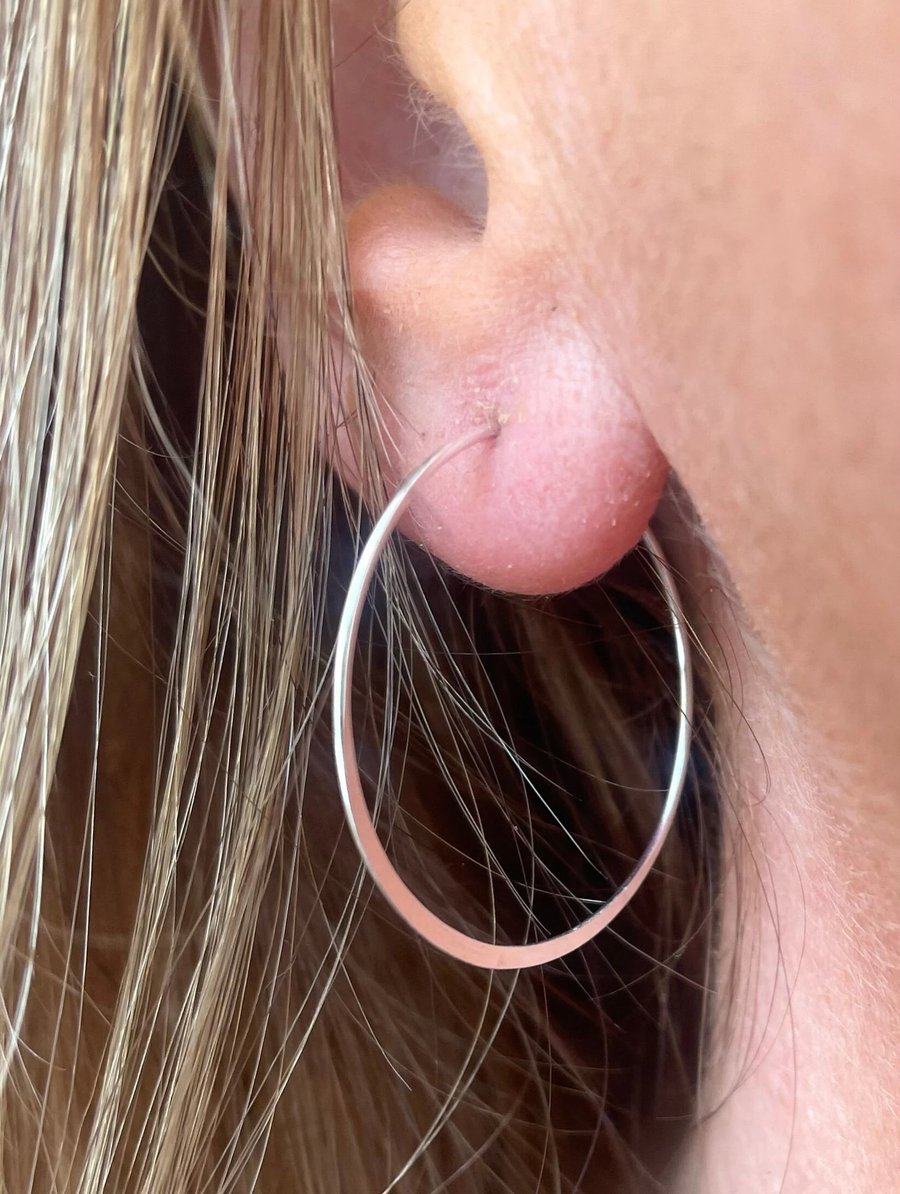 25mm Sterling Silver Hammered Flat Hoop Earrings.