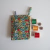 Bright floral Liberty fabric purse, make up or headphones bag. Mothers Day gift.