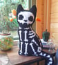 Spooky Cat Crochet Mini Cushion with sparkling bones