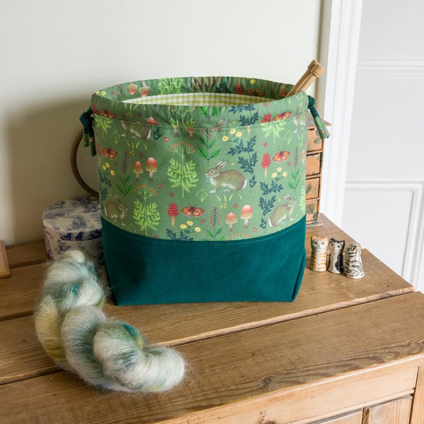 Drawstring project bag made with woodland rabbit print and fine needlecord