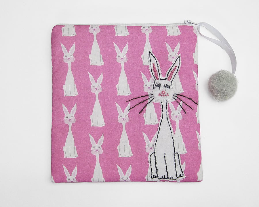 Pink make up bag with rabbit print and rabbit appliqué