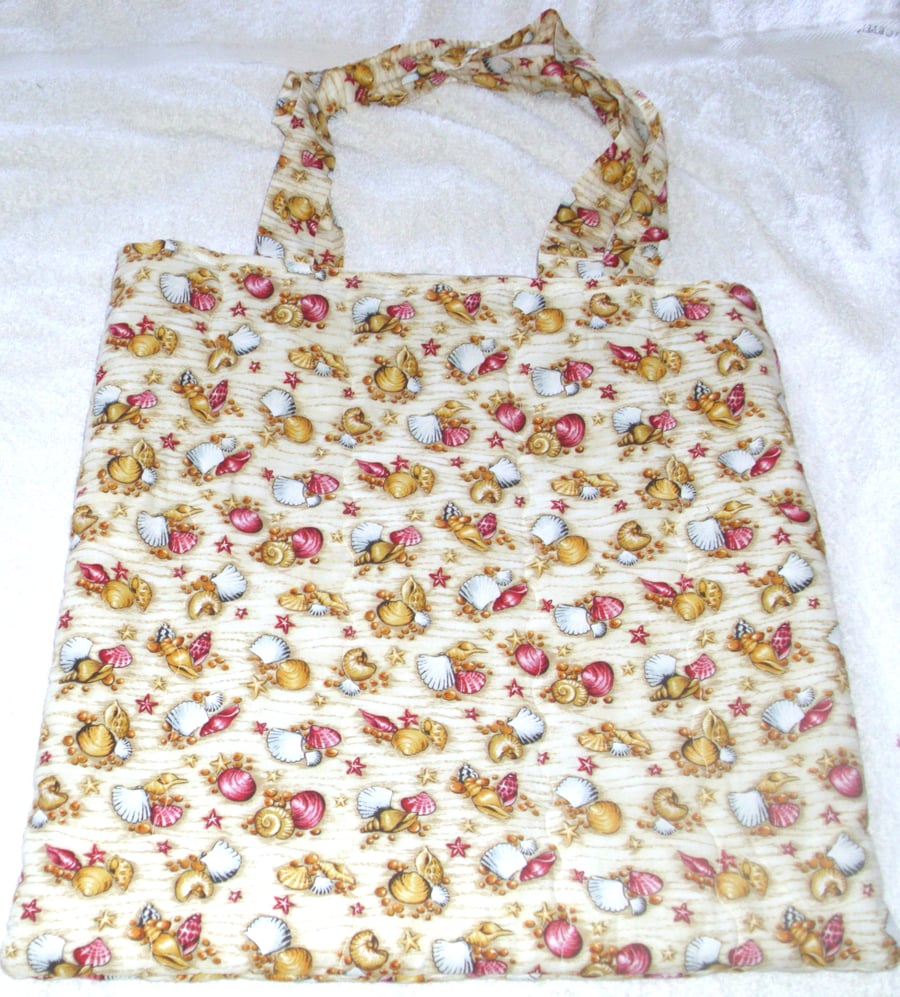 sea shells on the sandy seashore cloth bag