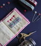 Patchwork stripe needle case made from Tilda fabric in shades of red and natural - Image 4