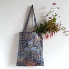 Tote bag in an Art Nouveau inspired print with foldaway pouch