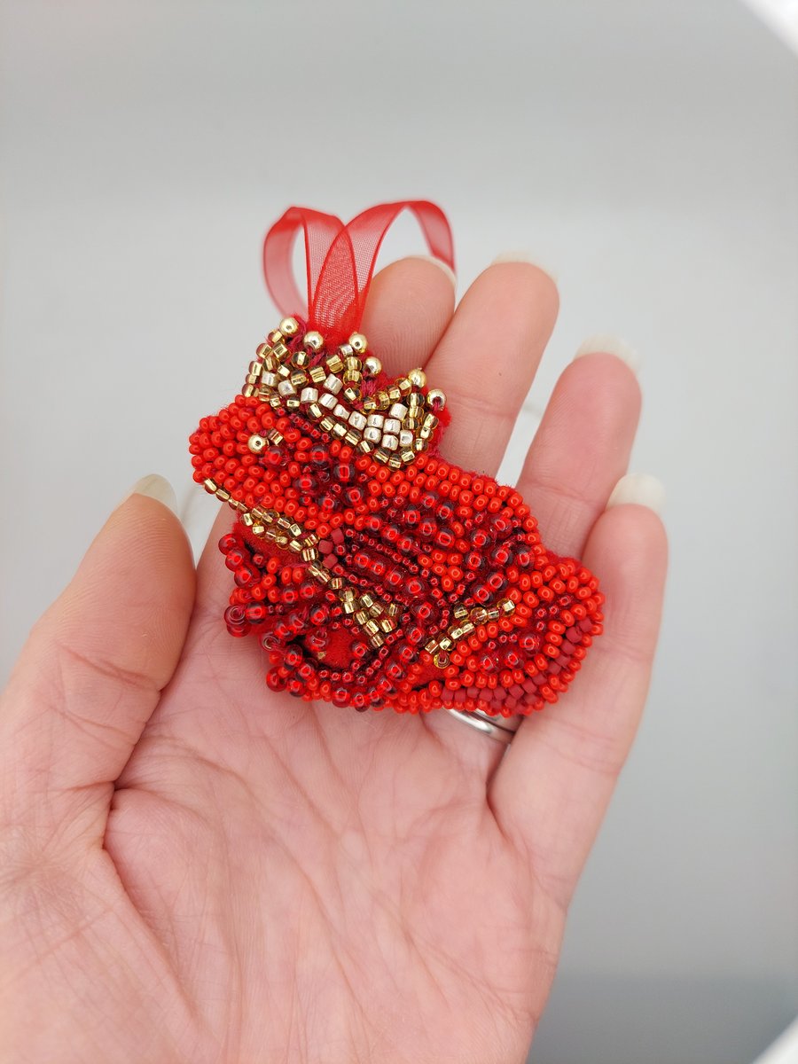 Red Frog wearing a gold crown decoration 