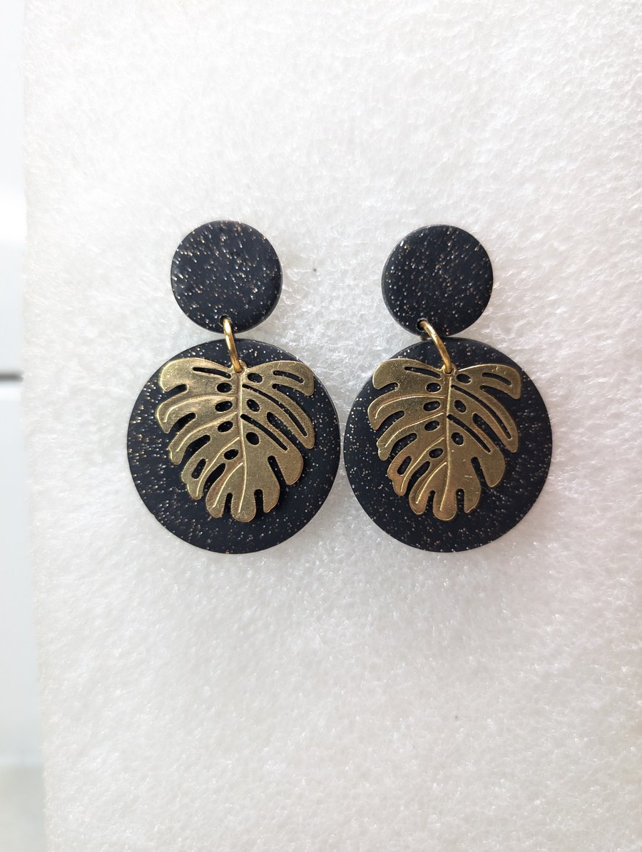 Black and sparkly monstera circle earrings 