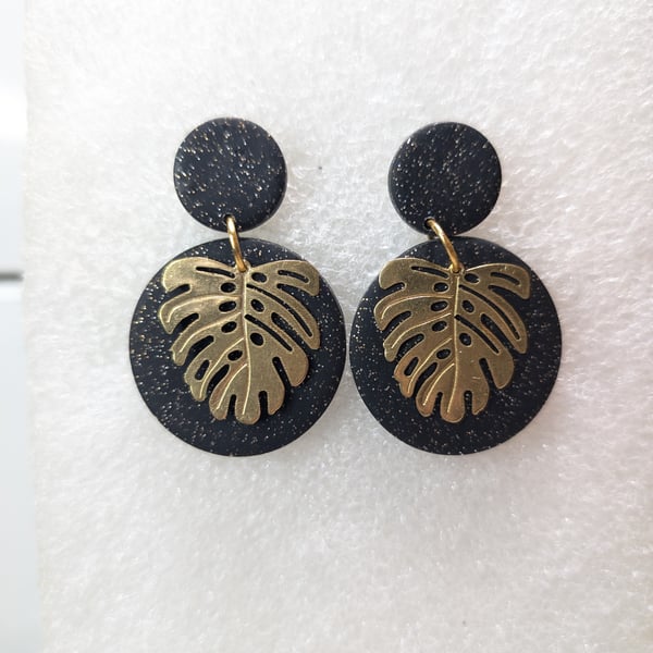 Black and sparkly monstera circle earrings 