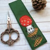 Embroidered mushroom bookmark. 