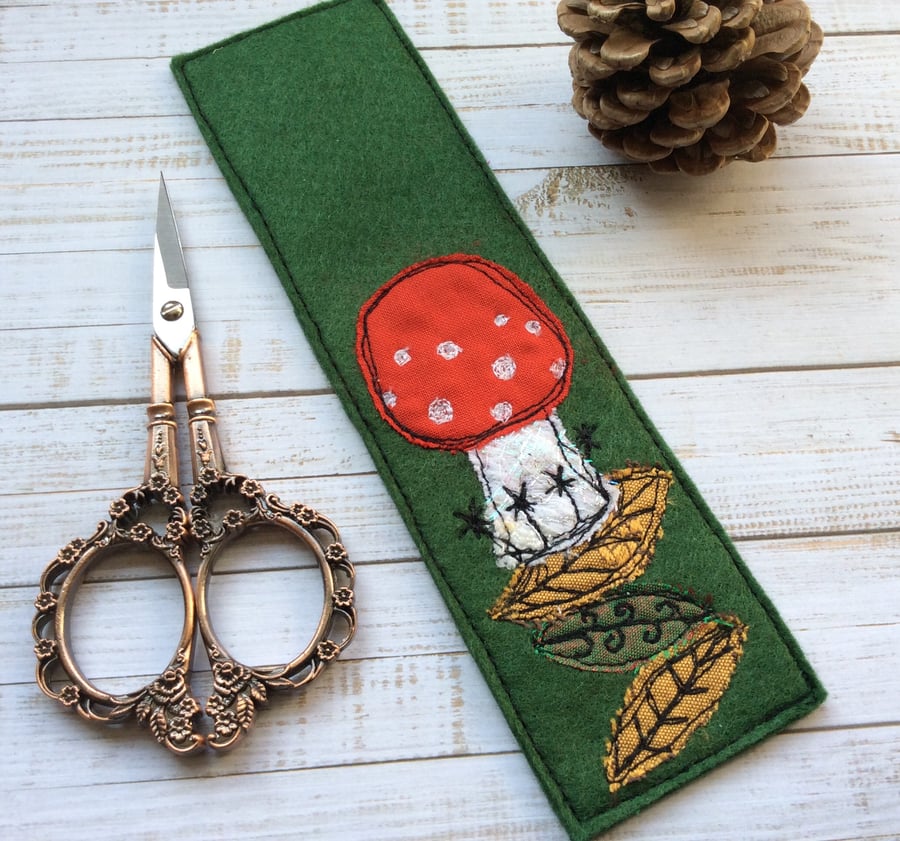 Embroidered mushroom bookmark. 