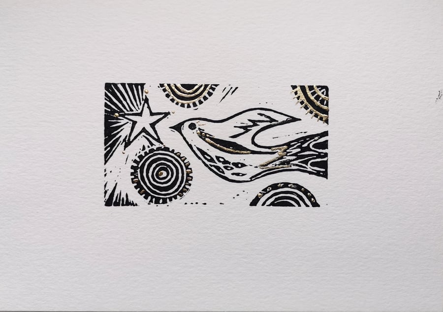 Star and Song bird original lino print in gold coloured metal leaf no.9
