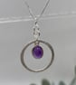 Silver circle pendant with amethyst