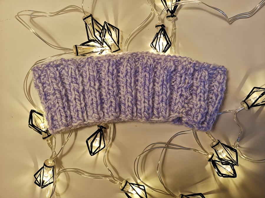 Handknitted purple earwarmer