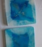 Set of two handmade epoxy resin square coasters. Blue and silver 