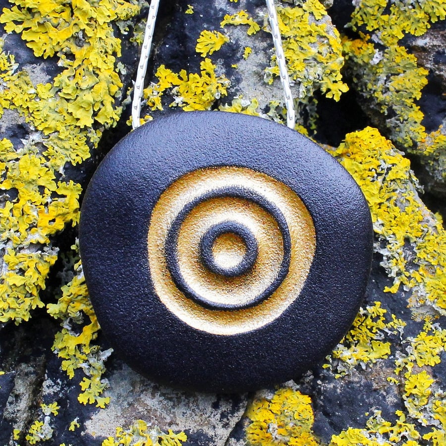 Black Pebble Pendant, Fossil. Nature inspired jewellery designed by John Field