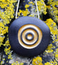 Black Pebble Pendant, Fossil. Nature inspired jewellery designed by John Field