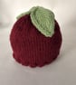 Children's hand knitted hat with leaf decoration