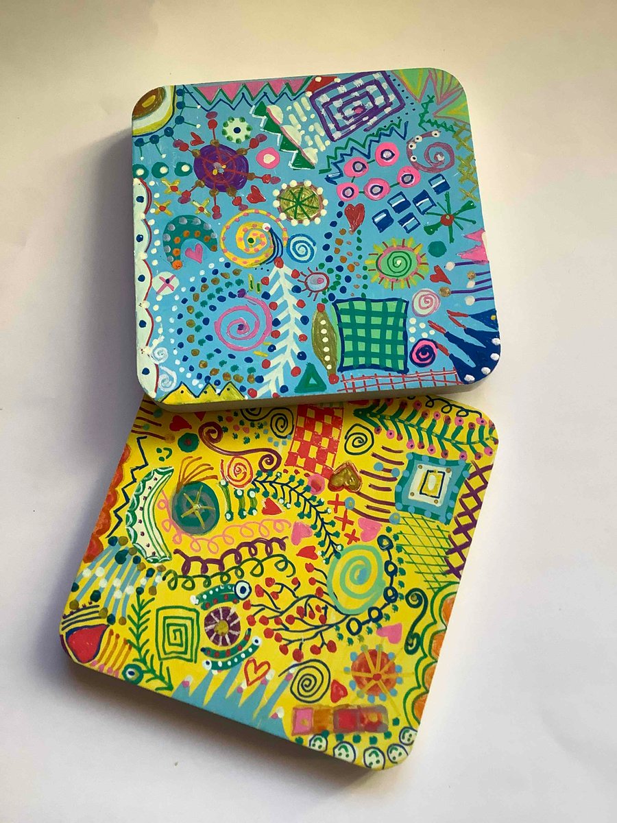 2 abstract hand painted wooden coasters