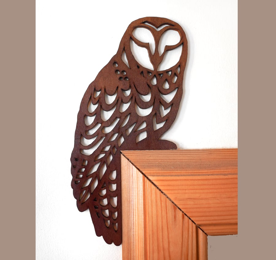 Owl door topper made from wood. Door corner