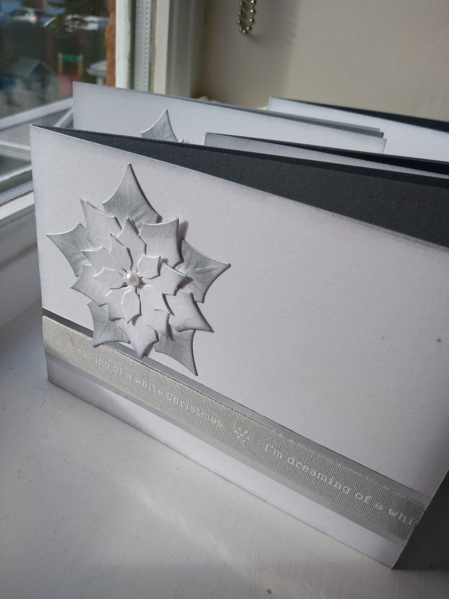 Pack of 4 white and silver poinsettia Christmas cards