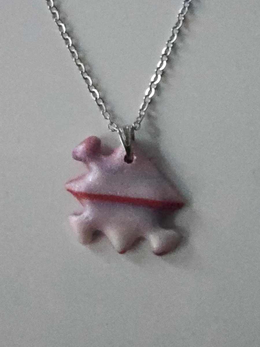 Jigsaw piece necklace