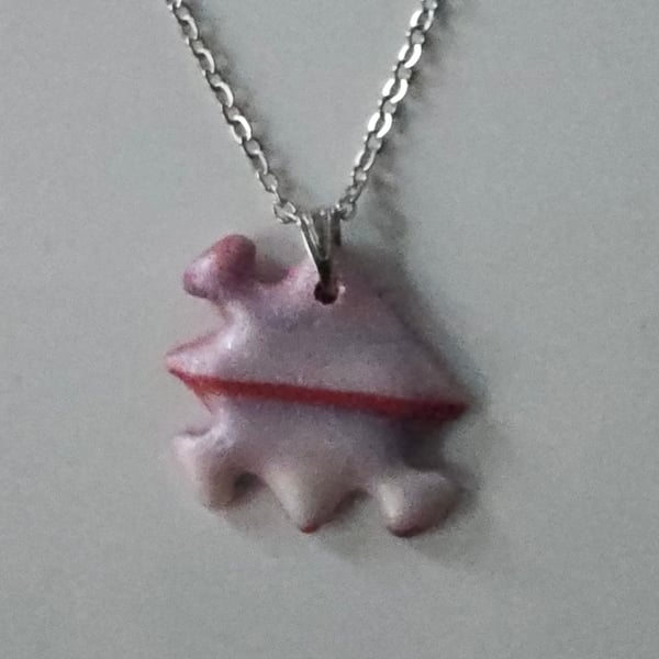 Jigsaw piece necklace