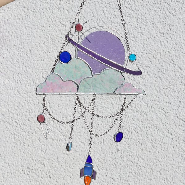Dreamcatcher Cosmic landscape Purple Saturn in clouds with a rocket Stain glass 