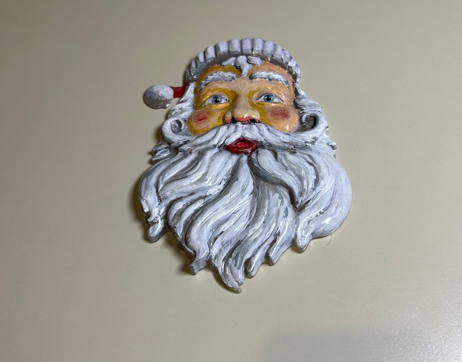 A hand painted and resin layered Father Christmas by Andrew Jenkins