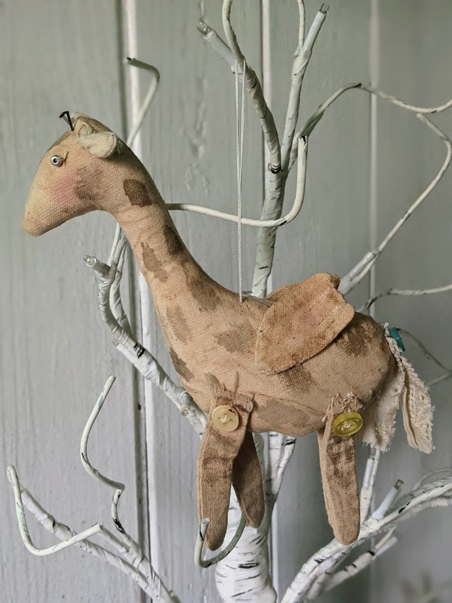 Handmade primigive fair giraffe