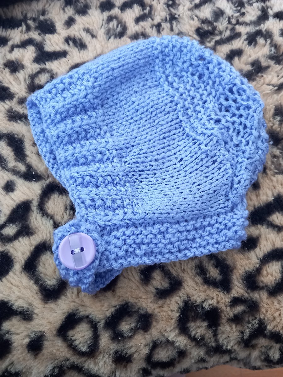 Lilac hand knitted childs hat helmet hood and booties set