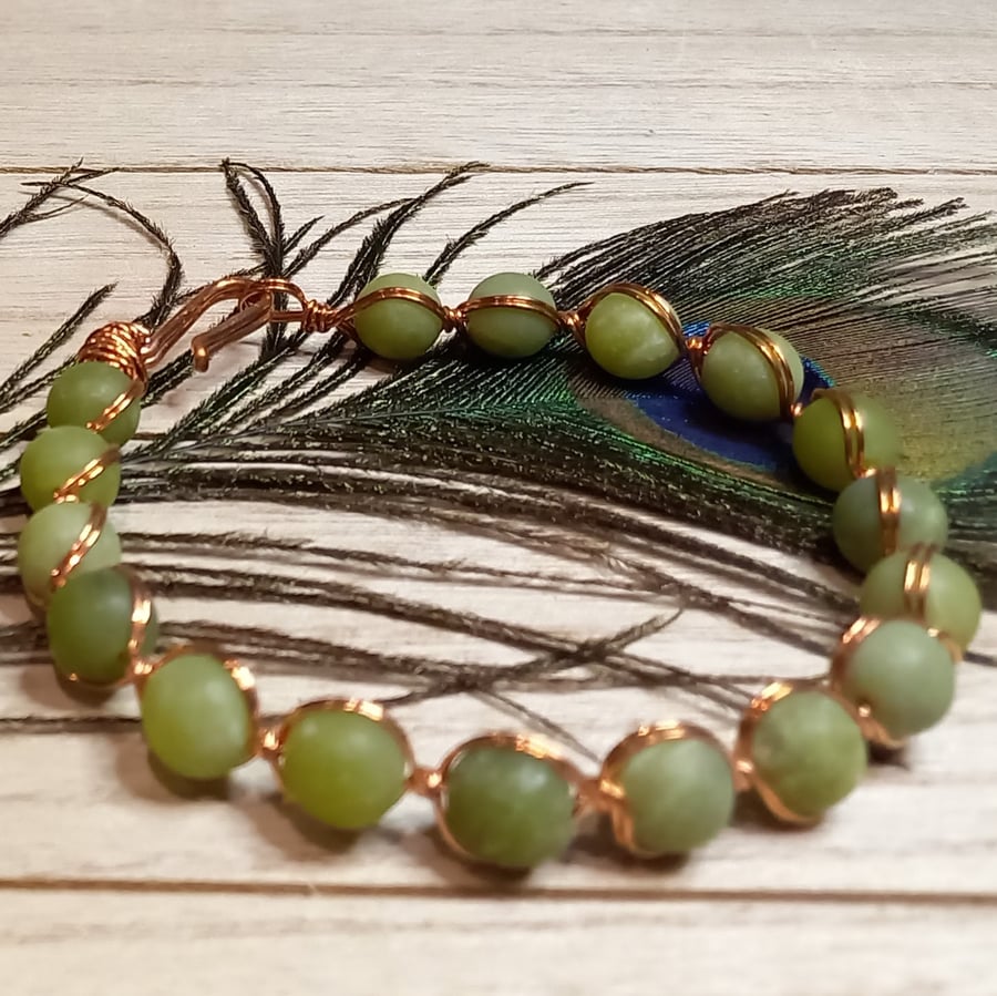 Twisted copper wire bracelet with jade beads
