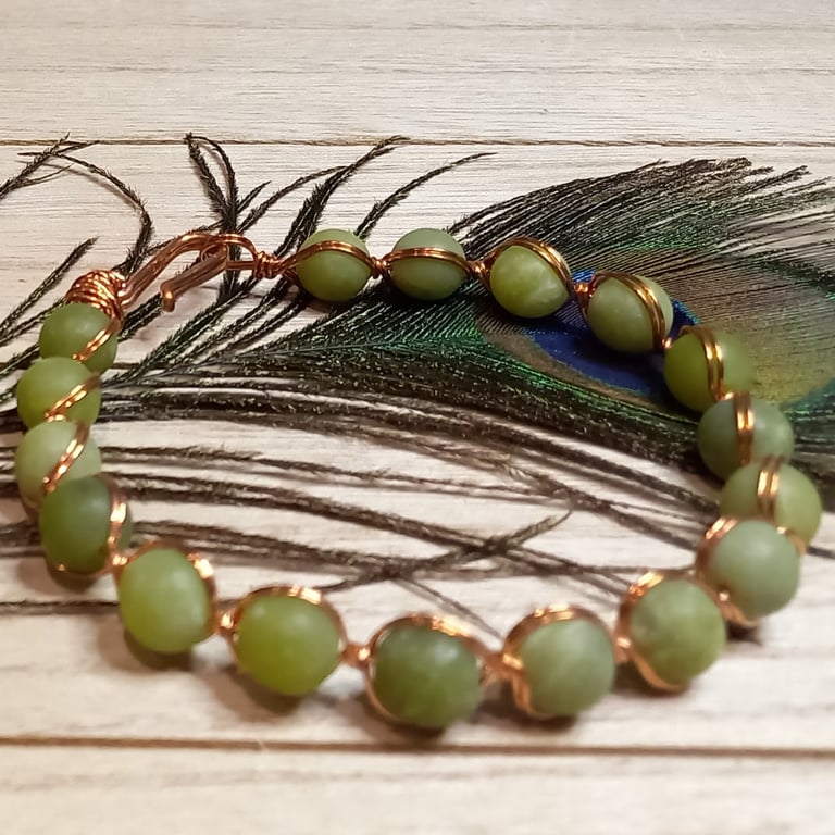 Twisted copper wire bracelet with jade beads