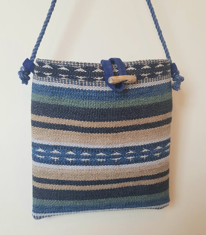 Crossbody bag: cotton and jute with driftwood toggle, shades of blue and aqua