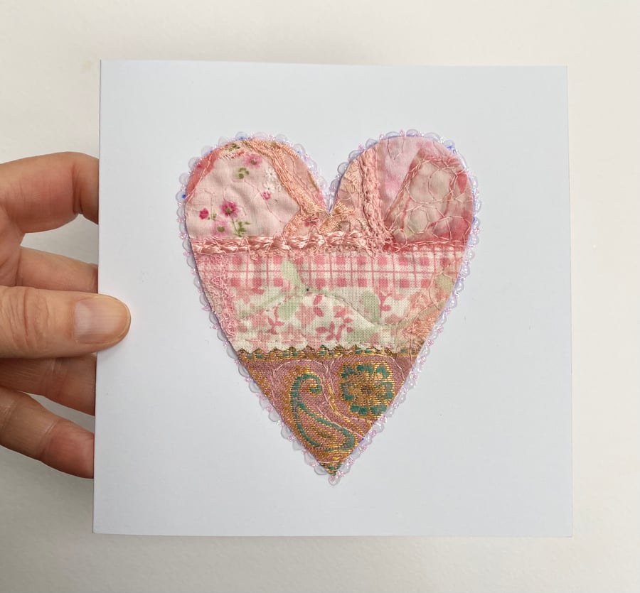 Up-cycled handmade fabric embroidered heart card. 