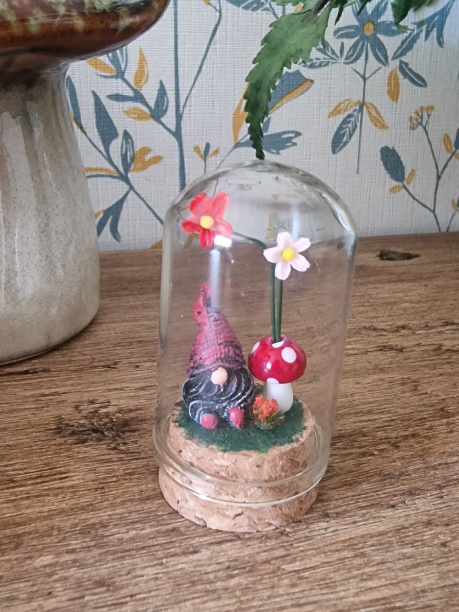 Miniature glass dome with a gnome, flowers & mushroom scene