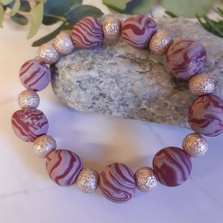 Pretty handmade raspberry and pink polymer clay bracelet