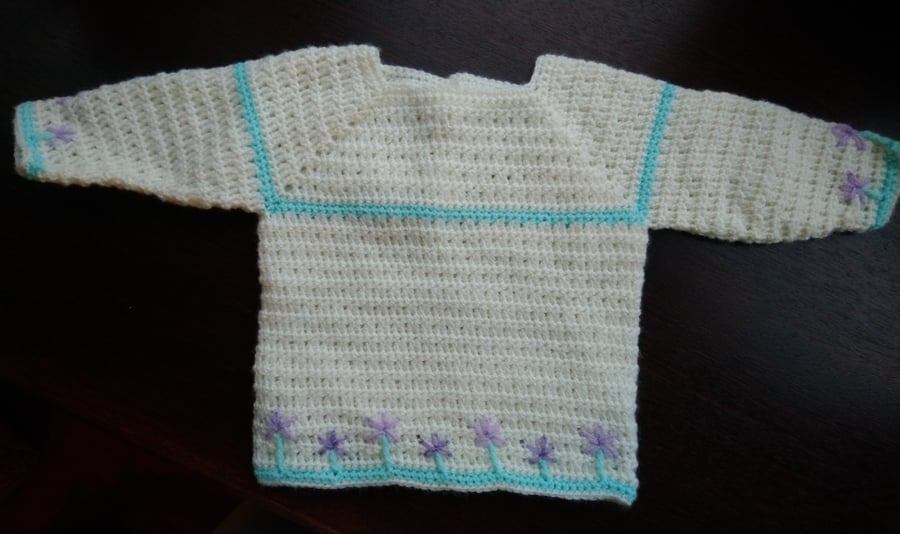 Crochet Baby jumper in cream with mauve embroidered flowers 22 in. 