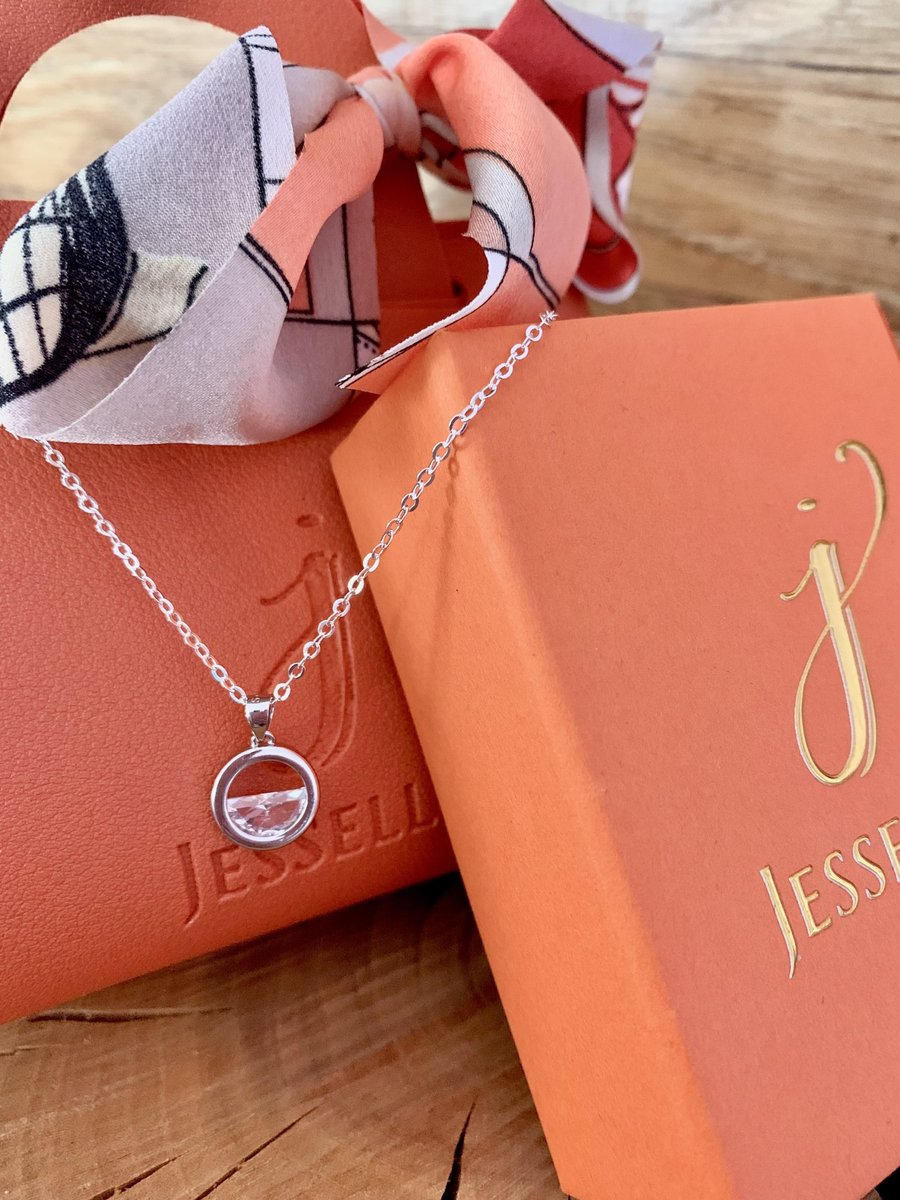 Clear Quartz "Glass Half Full" Pendant