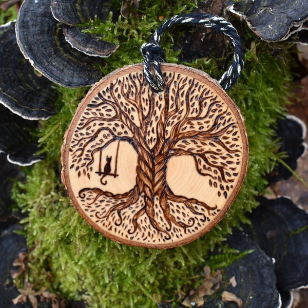 It's my swing. Pyrography cat and tree hanging disc, personalisable.