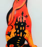 Halloween hare in orange  with spooky castle too