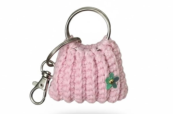 Small bag key, ear buds, spare coin holder