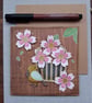 A basket of pink blossom and songbird handmade card, keepsake 